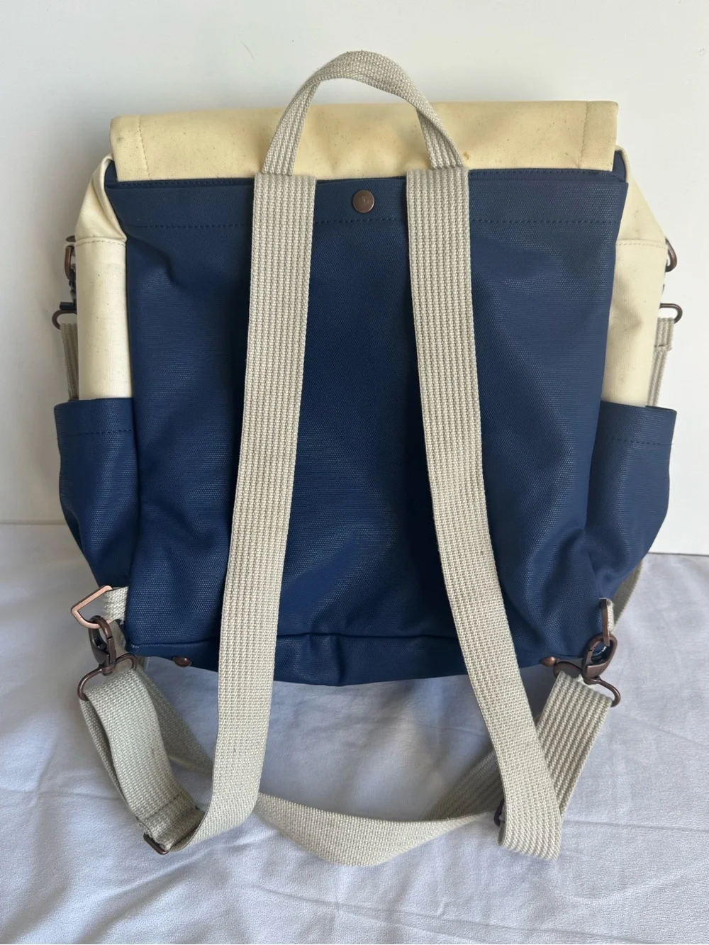 Petunia Pickle Bottom Boxy Backpack Diaper Bag in a geometric cream, navy, teal